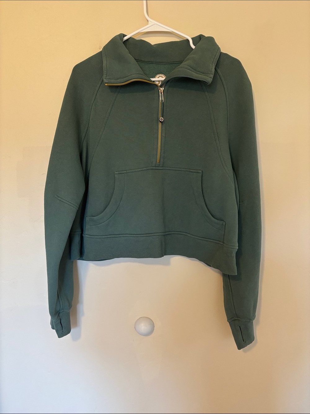 Lululemon Forest Green 1/2 zip cropped Scuba Hoodie with Gold logo and zipper